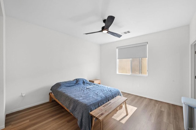 5485 Seacliff Pl Unit 106, San Diego, CA 92154 - bedroom featuring wood finished floors, baseboards, and a ceiling fan