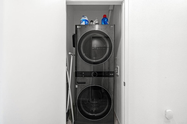 5485 Seacliff Pl Unit 106, San Diego, CA 92154 - laundry area featuring stacked washer / dryer