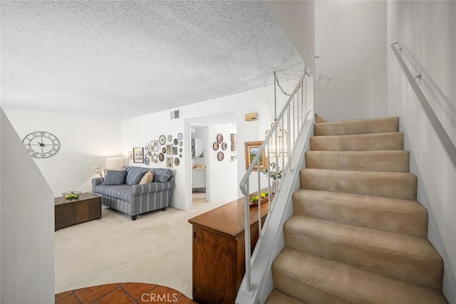 4418 Larwin Ave, Cypress, CA 90630 - staircase featuring carpet floors and a textured ceiling