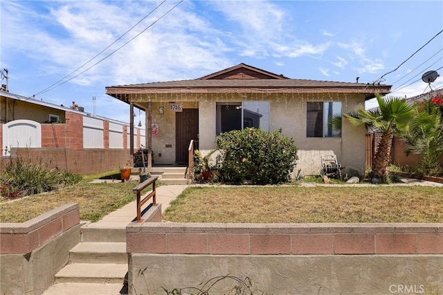 1716 N Fries Ave, Wilmington, CA 90744 - bungalow-style home featuring stucco siding