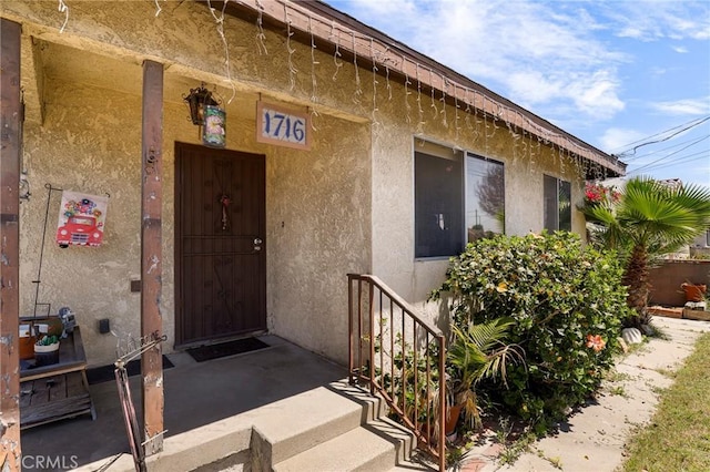 1716 N Fries Ave, Wilmington, CA 90744 - property entrance with stucco siding