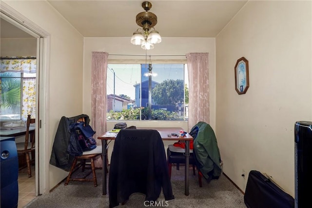 1716 N Fries Ave, Wilmington, CA 90744 - dining area with a chandelier and carpet flooring