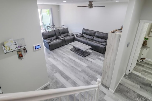 13217 Midnight Star Way, Lakeside, CA 92040 - living area featuring ceiling fan, wood finished floors, and baseboards