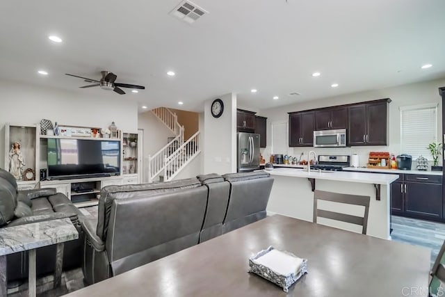 13217 Midnight Star Way, Lakeside, CA 92040 - dining area with recessed lighting, a ceiling fan, stairs, and light wood-style flooring