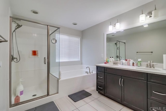 13217 Midnight Star Way, Lakeside, CA 92040 - bathroom with double vanity, a garden tub, a shower stall, and tile patterned floors