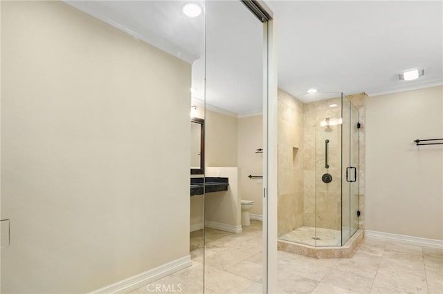 3413 Punta Alta Unit A, Laguna Woods, CA 92637 - bathroom with baseboards, a shower stall, toilet, crown molding, and recessed lighting