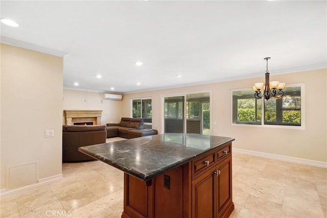 3413 Punta Alta Unit A, Laguna Woods, CA 92637 - kitchen with a wall mounted AC, baseboards, a chandelier, crown molding, and recessed lighting
