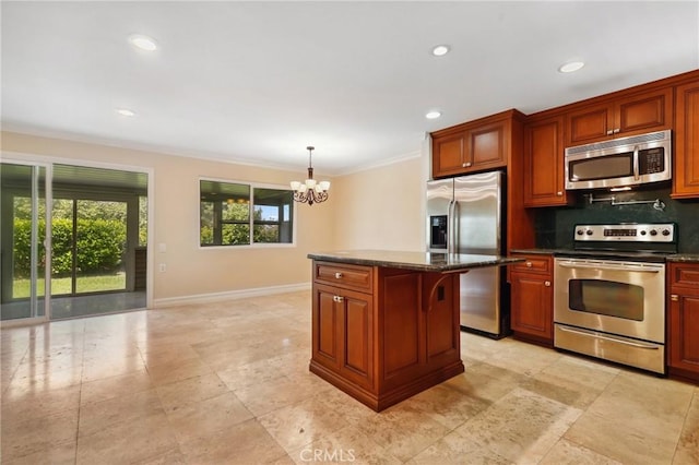 3413 Punta Alta Unit A, Laguna Woods, CA 92637 - kitchen featuring appliances with stainless steel finishes, a chandelier, ornamental molding, a center island, and tasteful backsplash