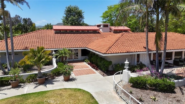 3413 Punta Alta Unit A, Laguna Woods, CA 92637 - view of front of home featuring a tile roof, french doors, and stucco siding