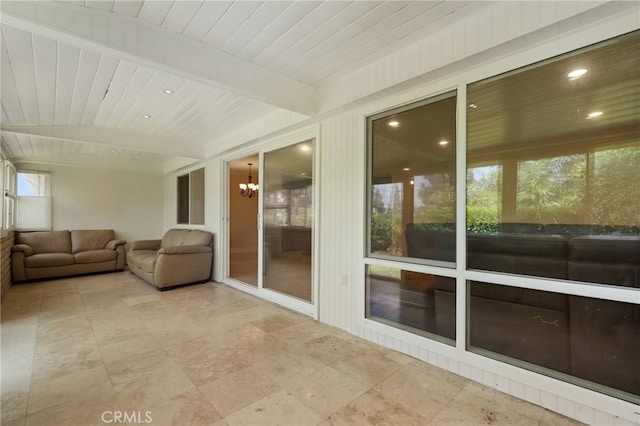 3413 Punta Alta Unit A, Laguna Woods, CA 92637 - sunroom featuring a chandelier, recessed lighting, and wood ceiling with exposed beams