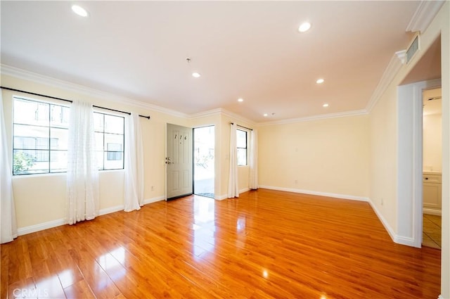 10894 Olinda St Unit 116, Sun Valley, CA 91352 - spare room featuring plenty of natural light, baseboards, light wood-style floors, ornamental molding, and recessed lighting
