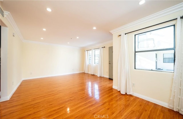 10894 Olinda St Unit 116, Sun Valley, CA 91352 - empty room featuring ornamental molding, light wood finished floors, recessed lighting, and baseboards
