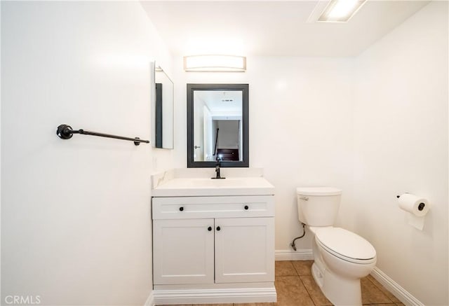 10894 Olinda St Unit 116, Sun Valley, CA 91352 - half bathroom with toilet, vanity, baseboards, and tile patterned flooring