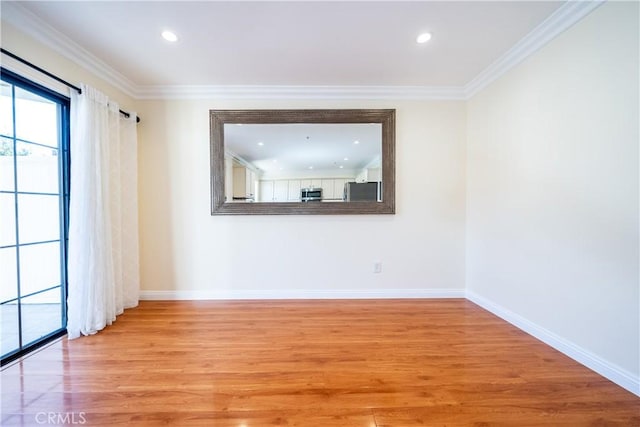 10894 Olinda St Unit 116, Sun Valley, CA 91352 - unfurnished room with light wood-style floors, baseboards, ornamental molding, and recessed lighting