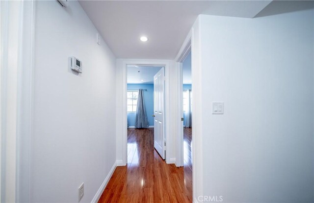 10894 Olinda St Unit 116, Sun Valley, CA 91352 - hallway featuring wood finished floors, baseboards, and recessed lighting