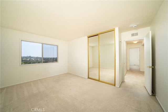 26611 Loma Verde, Mission Viejo, CA 92691 - unfurnished bedroom featuring light colored carpet and a closet