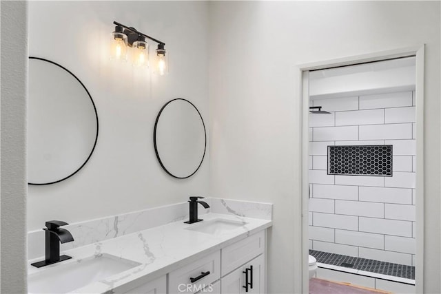 13565 Monterey Rd, Desert Hot Springs, CA 92240 - bathroom with double vanity, toilet, and tiled shower