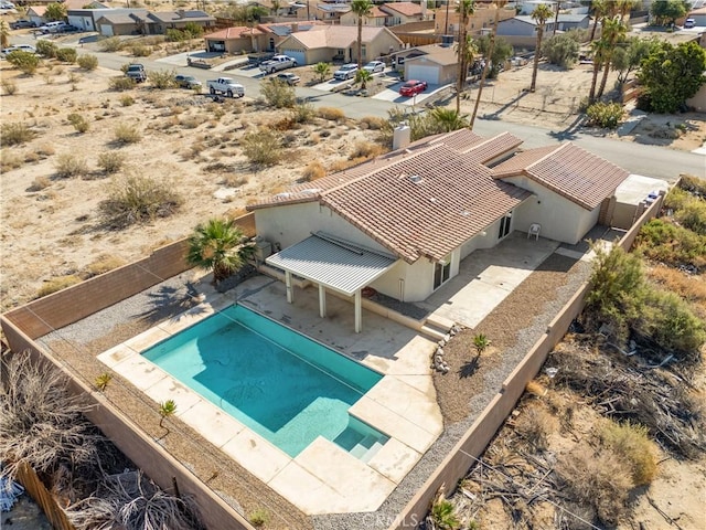 13565 Monterey Rd, Desert Hot Springs, CA 92240 - aerial perspective of suburban area with a pool