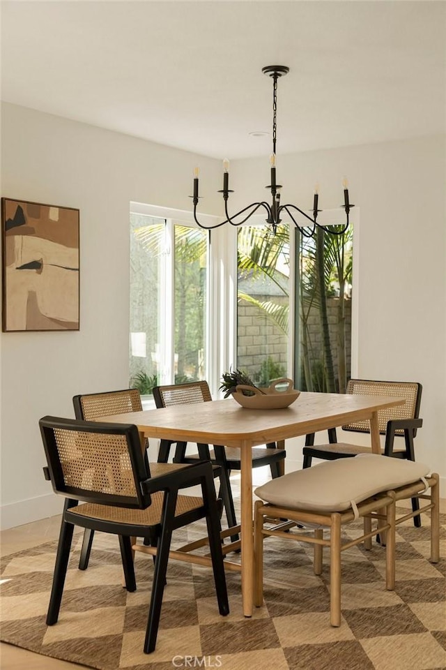 13 Lucero W, Irvine, CA 92620 - dining area with a chandelier and baseboards