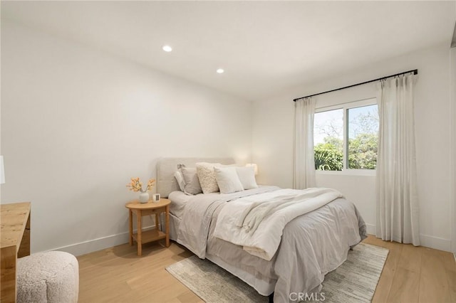 13 Lucero W, Irvine, CA 92620 - bedroom featuring baseboards, light wood finished floors, and recessed lighting