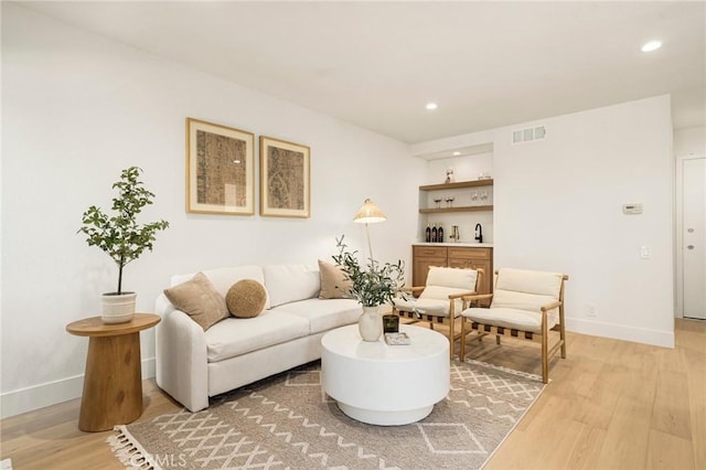 13 Lucero W, Irvine, CA 92620 - living area with light wood-type flooring, baseboards, and recessed lighting