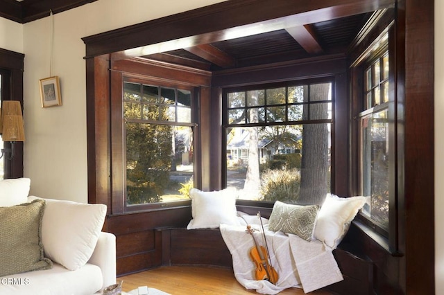 1813 Wayne Ave, South Pasadena, CA 91030 - sitting room featuring healthy amount of natural light, wood finished floors, wooden ceiling with exposed beams, and crown molding