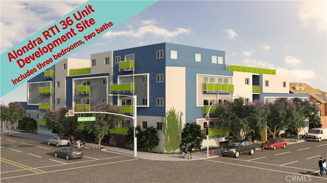 16101 S Figueroa St, Gardena, CA 90248 - view of apartment building / complex featuring uncovered parking