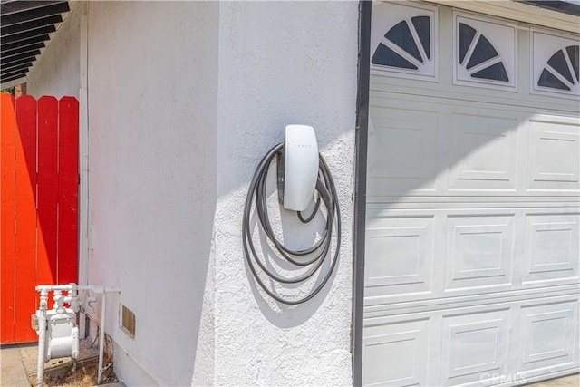 17915 Los Vasos St, Fountain Valley, CA 92708 - exterior view of stucco siding and car charger