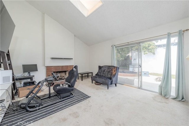 17915 Los Vasos St, Fountain Valley, CA 92708 - living area featuring carpet floors, vaulted ceiling, a brick fireplace, and a skylight