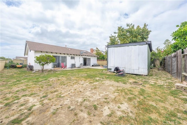 17915 Los Vasos St, Fountain Valley, CA 92708 - back of house with a fenced backyard and a patio area
