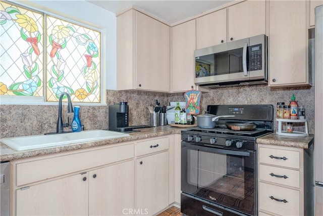 17915 Los Vasos St, Fountain Valley, CA 92708 - kitchen with stainless steel microwave, gas stove, a sink, decorative backsplash, and dishwasher