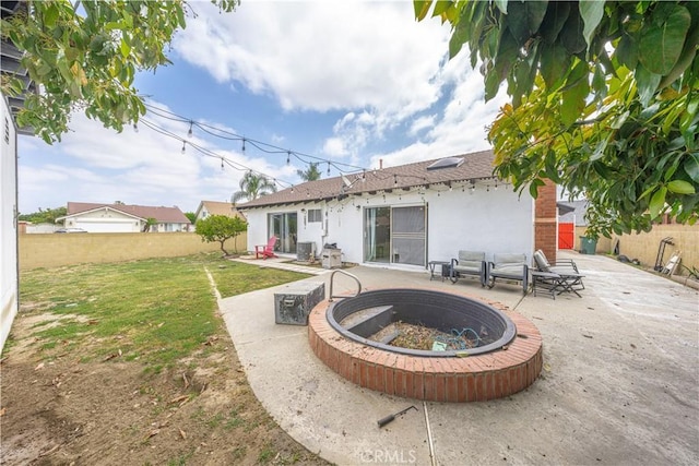 17915 Los Vasos St, Fountain Valley, CA 92708 - back of house with an outdoor fire pit, stucco siding, a patio, a shingled roof, and central AC unit