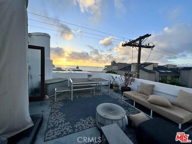 14 Mast St Unit 1, Marina Del Rey, CA 90292 - view of patio / terrace with outdoor lounge area and a water view