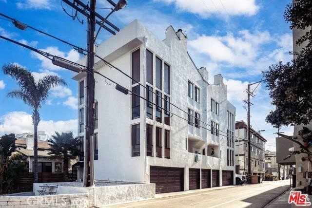 14 Mast St Unit 1, Marina Del Rey, CA 90292 - view of property with an attached garage