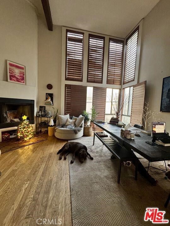 14 Mast St Unit 1, Marina Del Rey, CA 90292 - office with a high ceiling, wood finished floors, and a fireplace