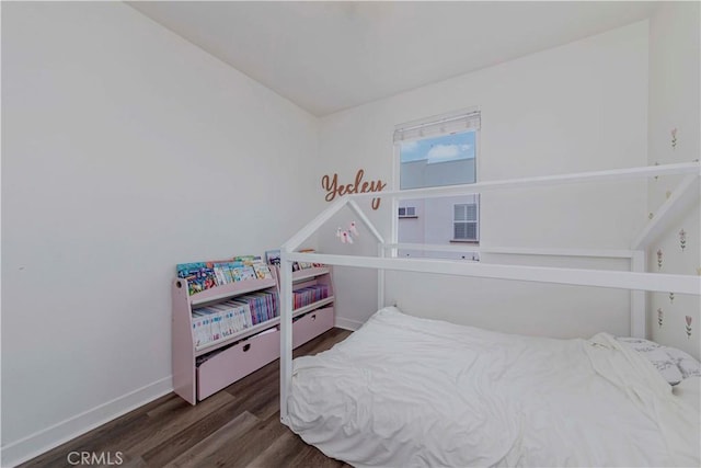 9213 Sunshine Pl, Downey, CA 90240 - bedroom with wood finished floors and baseboards
