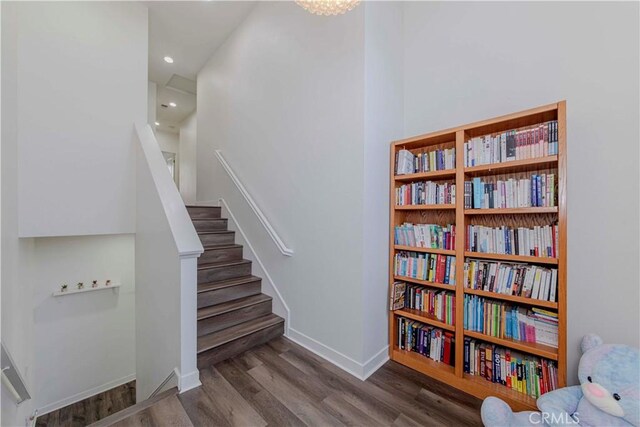 9213 Sunshine Pl, Downey, CA 90240 - stairs featuring wood finished floors, baseboards, and recessed lighting