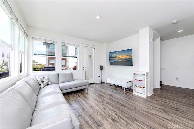 9213 Sunshine Pl, Downey, CA 90240 - living area featuring wood finished floors, healthy amount of natural light, and recessed lighting