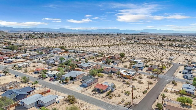 6365 Cahuilla Ave Unit 29, Palms, CA 92277 - aerial view of residential area featuring mountains and a desert landscape