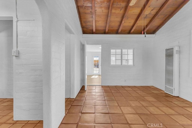 6365 Cahuilla Ave Unit 29, Palms, CA 92277 - unfurnished room with a heating unit, wooden ceiling, and light tile patterned floors