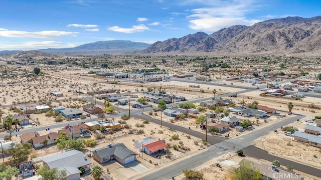 6365 Cahuilla Ave Unit 29, Palms, CA 92277 - drone / aerial view of a mountainous background