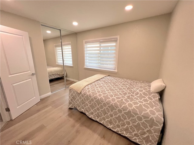 1763 Eastview Ave, Upland, CA 91784 - bedroom featuring light wood-type flooring, a closet, recessed lighting, and baseboards