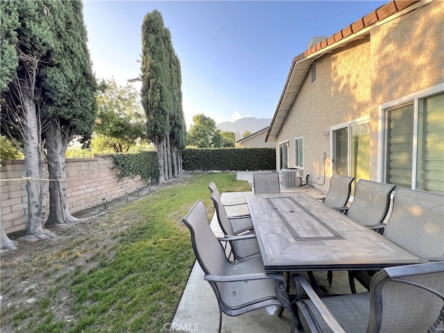 1763 Eastview Ave, Upland, CA 91784 - view of patio / terrace featuring outdoor dining area, a mountain view, and central AC