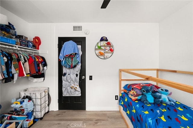 1138 Millstream Ln, Corona, CA 92878 - bedroom featuring wood finished floors, baseboards, and ceiling fan