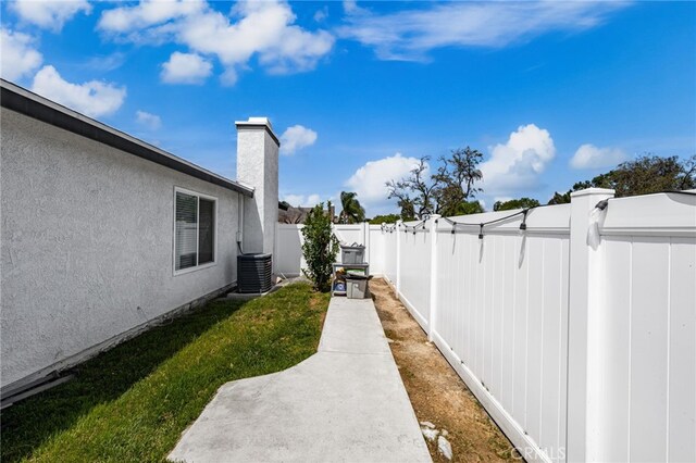 1138 Millstream Ln, Corona, CA 92878 - view of yard with cooling unit and a patio area