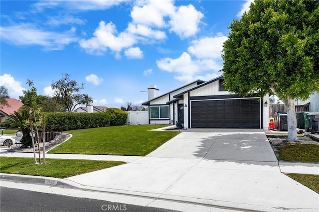 1138 Millstream Ln, Corona, CA 92878 - view of front of home featuring an attached garage, driveway, and a chimney