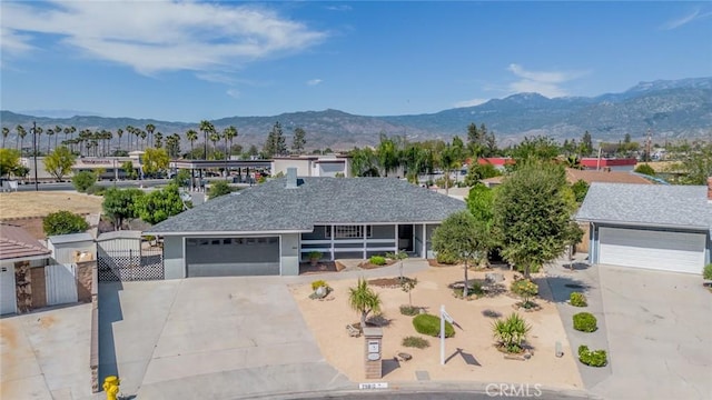 25810 San Felipe Dr, Hemet, CA 92544 - single story home featuring a garage, a mountain view, driveway, and covered porch