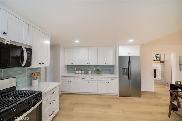 25810 San Felipe Dr, Hemet, CA 92544 - kitchen featuring stainless steel appliances, white cabinets, backsplash, and recessed lighting