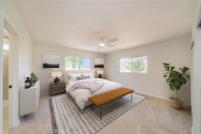 25810 San Felipe Dr, Hemet, CA 92544 - bedroom with multiple windows, light carpet, baseboards, and a ceiling fan