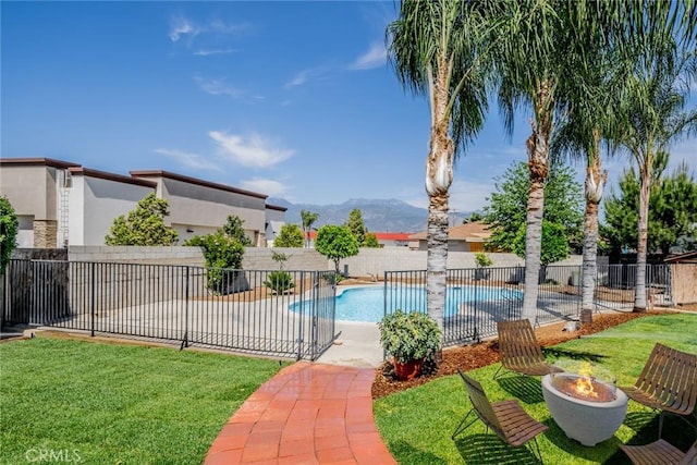 25810 San Felipe Dr, Hemet, CA 92544 - view of pool with a mountain view, a fire pit, and a patio